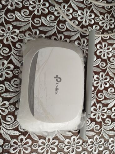 TP-Link markalı ağ ruter, etibarlı simsiz bağlantı təmin etmək üçün