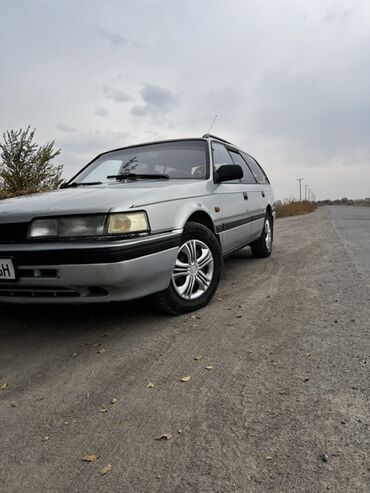 обшивка дверных карт: Mazda 626: 1992 г., 2 л, Механика, Бензин, Универсал