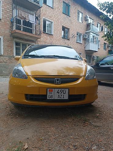 прикурит машина: Honda Fit: 2006 г., 1.3 л, Автомат, Бензин, Хэтчбэк — 1