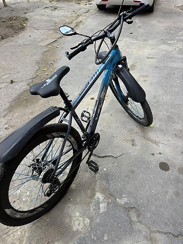 Спортивные велосипеды: Şəhər və yüngül yolsuzluq üçün uyğun dağ tipli velosiped. Şəkillərdə — 1