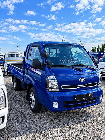 күзгү: Kia Bongo III, малотоннажный бортовой грузовик (синий). Кузов и — 3