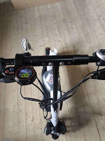 redline s50: Elektrik skuter – qara/qırmızı dizayn, güclü şəhər və off-road yürüşü — 7