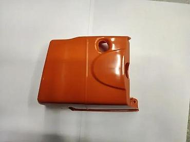 crane marka: Narandžasti poklopac motora za motornu testeru, izrađen od sjajne — 1