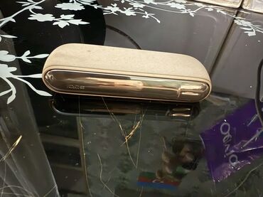 Qəlyan, vayp və aksesuarları: Məhsul: IQOS cihazı (elektron tütün qızdırıcı) Xüsusiyyətlər: - — 3