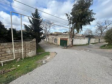 sekide: Buzovna yolunun kənarında,Polis akademiyasının yanında yerləşən həyət — 7