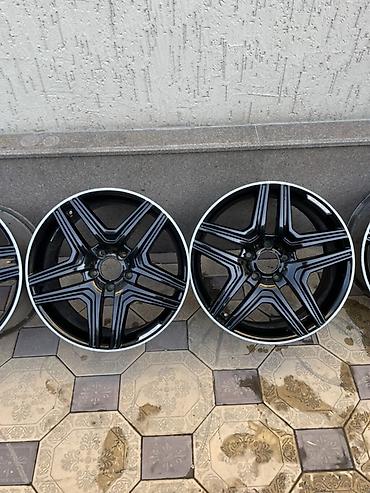 Диски: Комплект из 4 легкосплавных дисков AMG. - Диаметр: 20" (визуально — 6