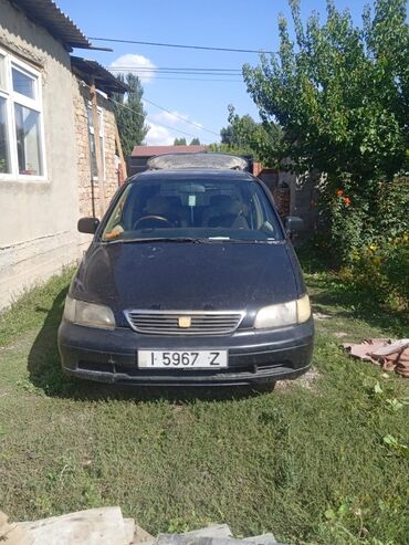 или меняю на дом: Черный минивэн Honda Odyssey с правым рулем, модель RA1, оснащенный