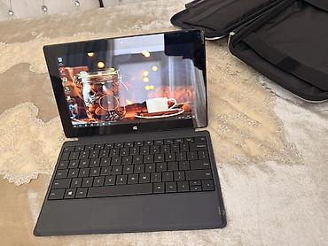 Digər noutbuklar və netbuklar: Microsoft Surface planşet-noutbuk hibridi Xüsusiyyətlər: - Ekran — 3