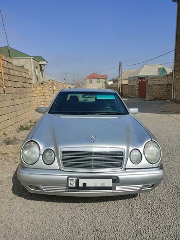 oluxana mercedes: Mercedes-Benz E 200: 2 l | 1997 il Sedan