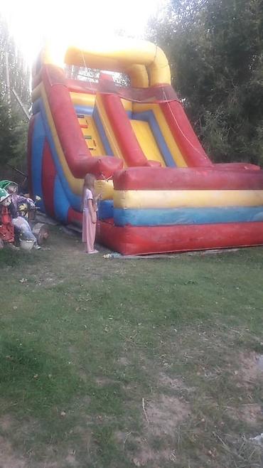 Детские аттракционы: Продаю или сдам в аренду батут - горка .размеры: высота - 4,5 м.длина — 9