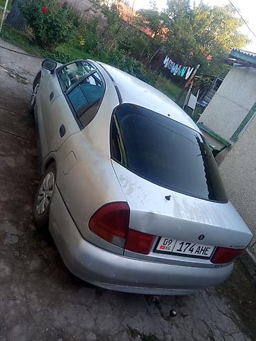 лансер машина: Mitsubishi Carisma: 1995 г., 1.8 л, Механика, Бензин — 3