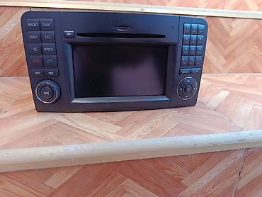 oka maşını: Mercedes-Benz orijinal multimedia/radio başlığı (NTG seriyası). Ön — 2