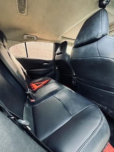 byd e1: Toyota Corolla: 2021 г., 1.8 л, Вариатор, Гибрид, Седан — 8