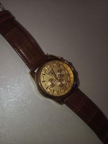 saat samdan: Tissot kişi qol saatı - Korpus: qızılı rəngli yuvarlaq metal korpus — 3