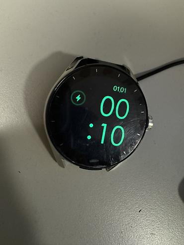 Другие смарт-часы: Умные часы со встроенным кейсом для TWS-наушников Особенности: - — 11