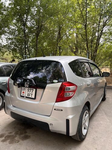 кара электрическая цена: Honda Fit: 2010 г., 1.3 л, Вариатор, Бензин, Универсал