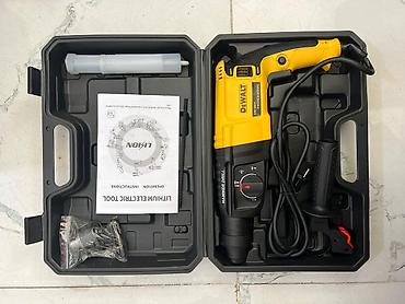 dewalt: Dəst şəklində təqdim olunan DEWALT elektrikli perforator. Möhkəm — 2
