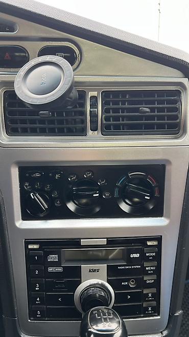 Унаа: Chevrolet Nexia: 2012 г., 1.6 л, Кол менен иштөөчү, Бензин, Седан — 10