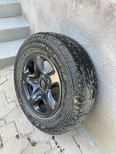 70: Колесо в сборе: шина + стальной диск R16. - Размер шины: 215/70 R16 — 3