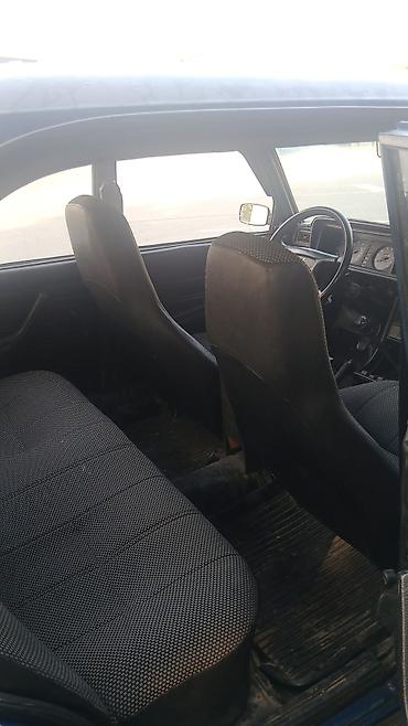 2107 qapı: VAZ 2107 sedan – mavi rəng, arxaötürücülü, klassik kuzov. - Kuzov: 4 — 7