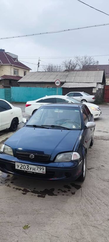 Suzuki: Suzuki Swift: 2002 г., 1.3 л, Автомат, Бензин, Седан