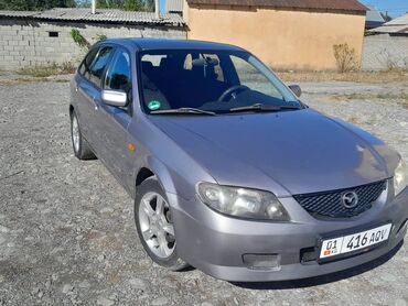 авто гольф 3: Mazda 323: 2002 г., 1.6 л, Механика, Бензин, Хэтчбэк