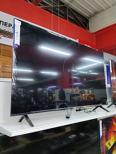 Смарт‑телевизор VISIN, диагональ около 55–65". Ключевые особенности