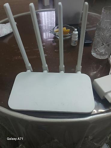 xiaomi modem 4a: Xiaomi Mi Wi‑Fi Router (4 antennali) Xüsusiyyətlər: - 4 ədəd yüksək — 1