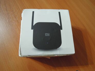 Модемы и сетевое оборудование: Усилитель сигнала "Xiaomi" Mi Wi-Fi Amplifier PRO "R03"