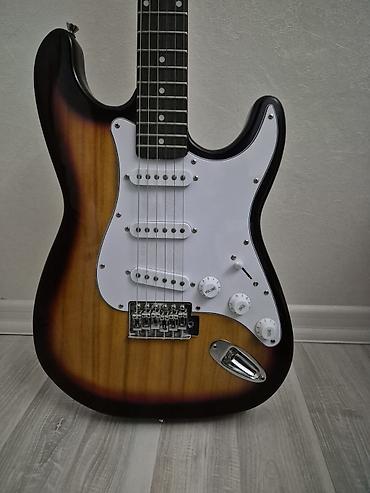 elektron gitara per page 40: Elektrik gitara – Strat tipli korpus, sunburst rəng keçidi — 3