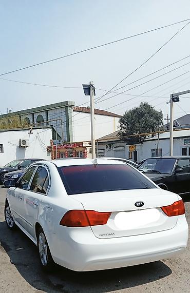 optima otracaqlar: Kia Optima sedan – ağ rəng, 4 qapı, ön‑çəkiş. 2008 ci il motor təzə — 4