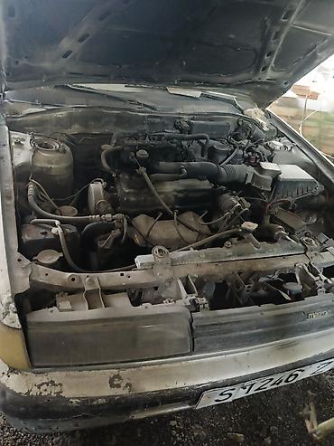 бак бенза: Mazda 323: 1990 г., 2 л, Механика, Бензин, Универсал — 5