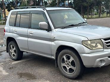 Унаа: Mitsubishi Pajero iO: 2003 г., 2 л, Автомат, Бензин, Жол тандабас — 1