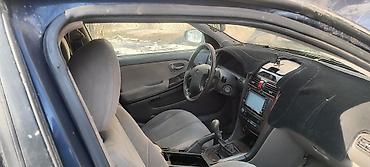 Другие автомобили: Легковой автомобиль седан. Основные особенности: - Кузов: 4-дверный — 12