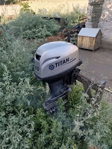 Кыймылдаткычтар, моторлор жана ГБЦ: Лодочный мотор TITAN Outboards 40 HP - Мощность: 40 л.с. (маркировка