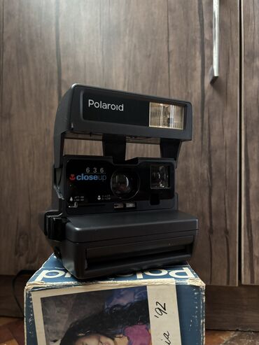 Fotokameralar: Fotoparat Poloroid tam islek veziyetdedir qiymetde razilasmaq olar