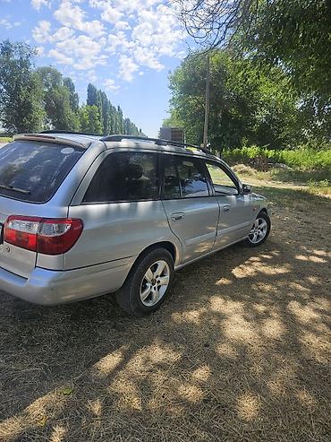 лад крузер: Mazda 626: 2001 г., 2 л, Механика, Бензин, Универсал — 4