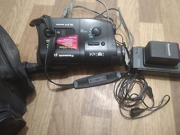 jack e4: Видеокамера Panasonic VHS-C с комплектом аксессуаров. Характеристики — 1