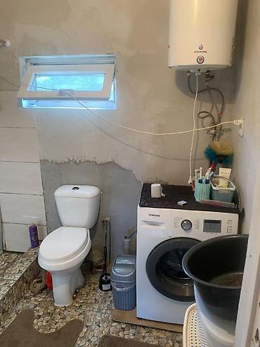 Продажа коттеджей и домов: Продаю дом в районе нового Ошского рынка. в одном участке есть 2 дома — 10