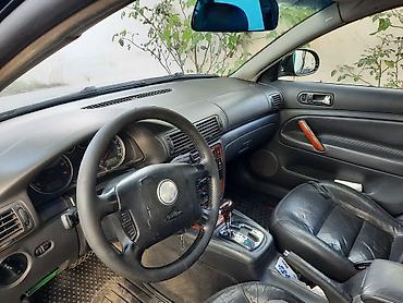 passat 2004: Volkswagen Passat (sedan), qara rəng. - Korpus: 4 qapılı, xrom yan — 5
