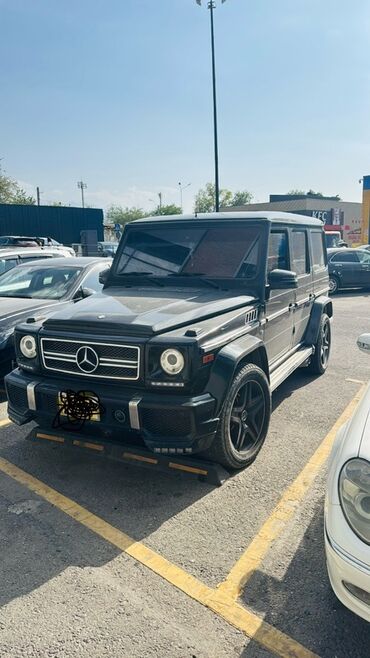автомобиль гелик: Полноразмерный внедорожник Mercedes-Benz G-класса черного цвета 2002
