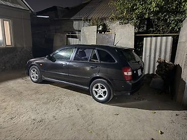 мустанг авто: Mazda 323: 2001 г., 2 л, Автомат, Газ, Универсал — 3