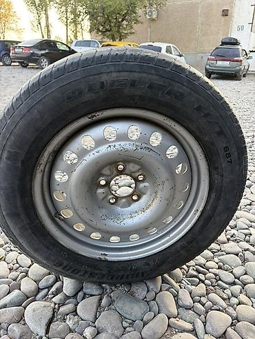 205 75 16: Шина Bridgestone Dueler H/T 687 на штампованном стальном диске — 2