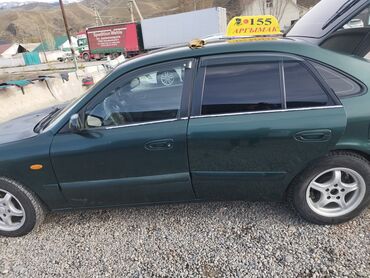 авто узген: Mazda