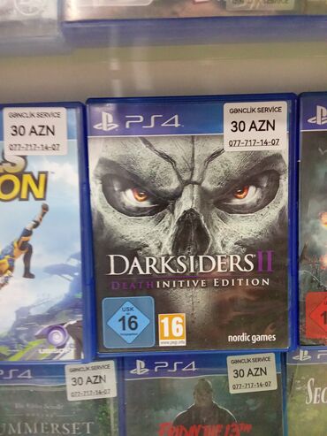Oyun diskləri və kartricləri: PlayStation 4 üçün Darksiders II Deathinitive Edition oyunu. Bu