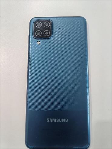 телевизор 165 см: Samsung Galaxy A12, цвет - Голубой, Две SIM карты — 2