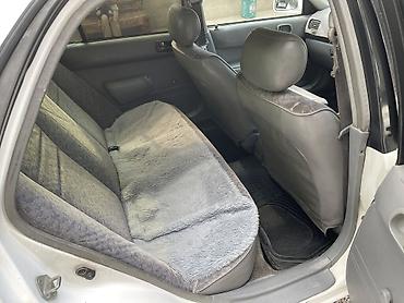 маржан лед: Toyota Corolla: 1997 г., 1.3 л, Автомат — 7