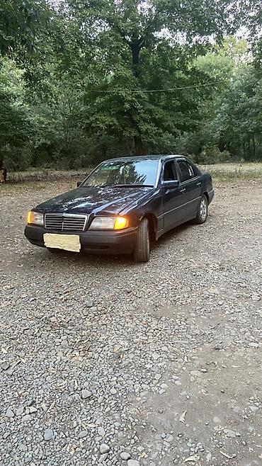 benzinli moped: Mercedes-Benz 220: 2.2 l | 1995 il Sedan — 5