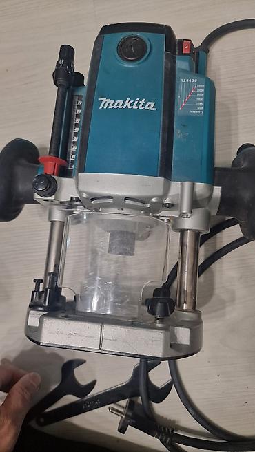 Инструменттер: Фрезер погружной Makita RP2301FC - Мощность: 2100 Вт - Питание — 2
