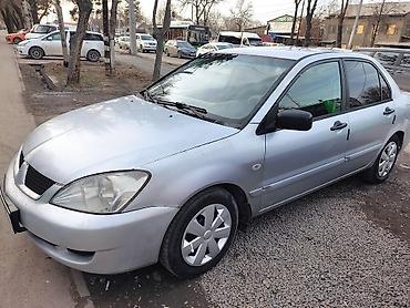 Mitsubishi: Mitsubishi Lancer: 2005 г., 1.3 л, Механика, Бензин, Седан — 2